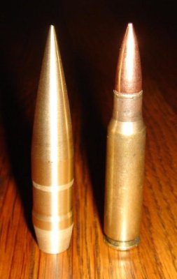 .50 projectile standing with a .308 Winchester cartridge